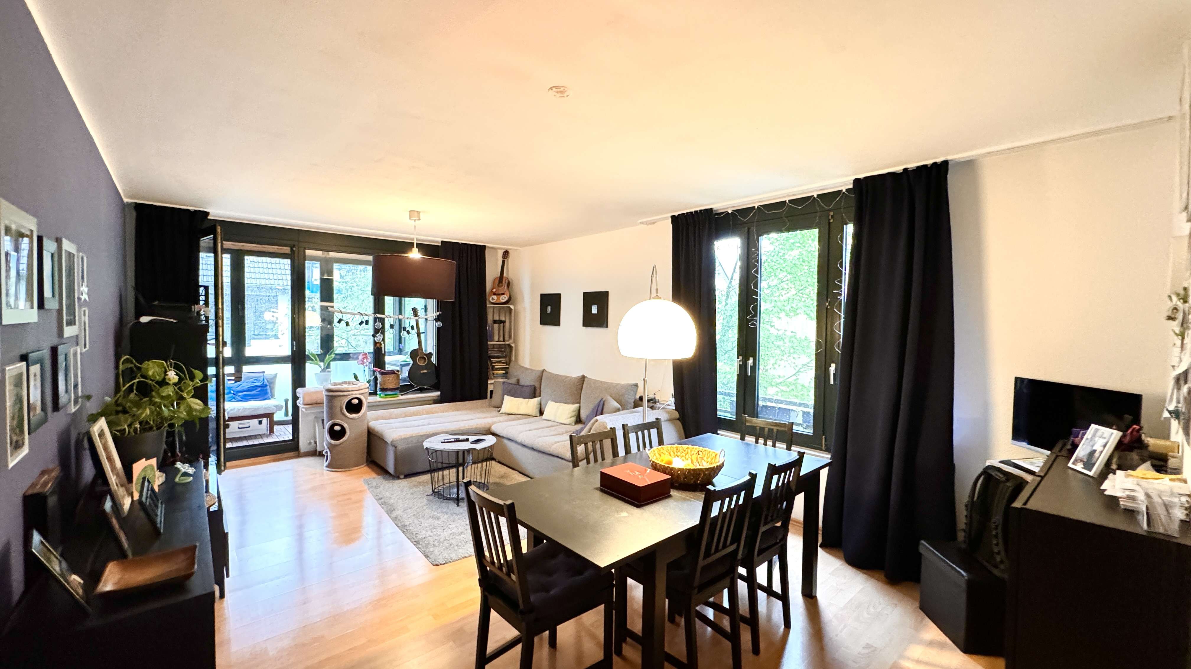 Immobilie in Monheim am Rhein - Vermietete Etagenwohnung mit Wintergarten und  PKW-Stellplatz im soliden Objekt in ruhiger Lage - Bild 1