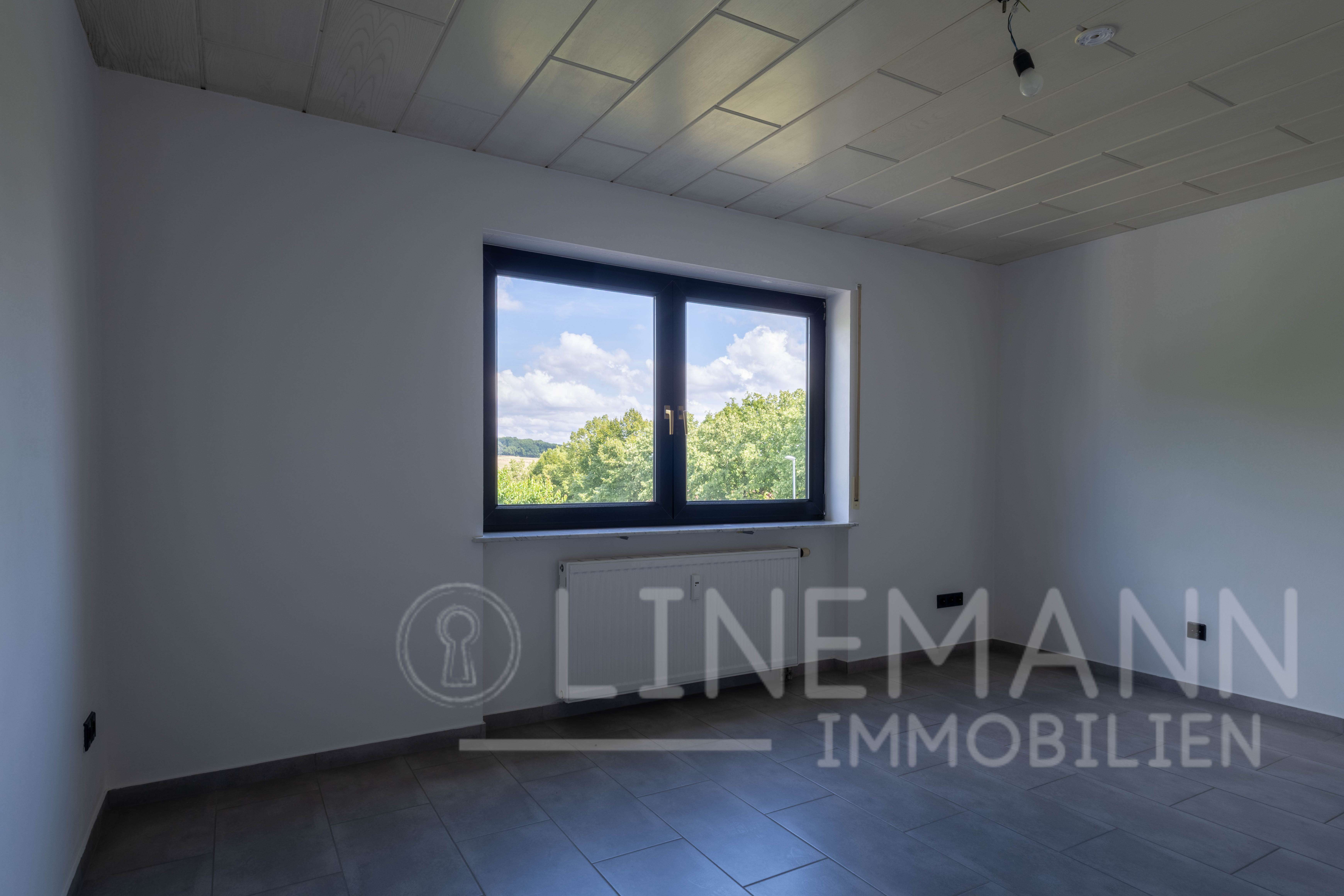 Immobilie in Hardheim - Ihr grüner Wohntraum: Saniertes 3-Familienhaus – Perfekt für Eigennutzer, Investoren und Familien - Bild 2