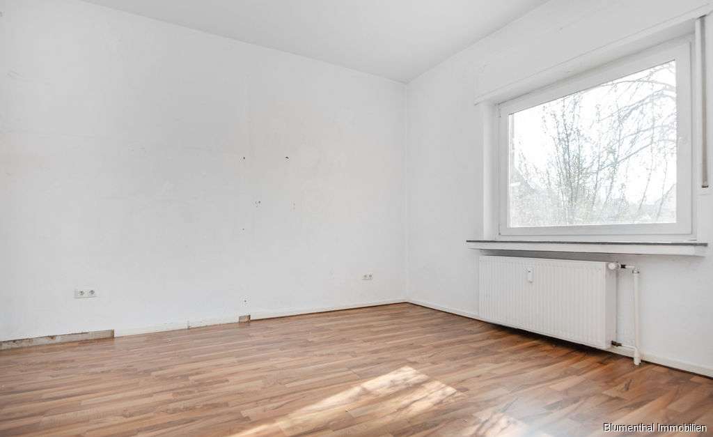 Immobilie in Enger - Zweifamilienhaus mit großzügigem Garten gen Süden in Westerenger - Bild 2