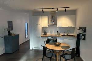 Exklusive 3,5-Zimmer WHG, große Dachterrasse, hochwertige Einbauküche & Tiefgarage im Zentrum ER