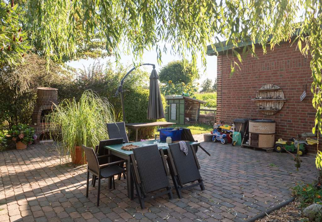 Immobilie in Grasberg - Einfamilienhaus mit Einliegerwohnung 
in idyllischer Lage - Bild 4