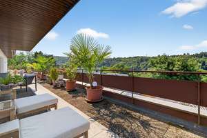 Traumhafte 4,5-Zimmer-Wohnung mit großer Dachterrasse und Doppelgarage