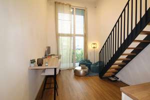 Loft-Apartment mit Einbauküche