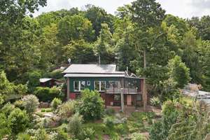 Bezauberndes Einfamilienhaus mit Einliegerwohnung, großzügigem Gartengrundstück, Terrassen