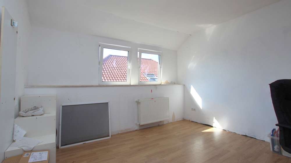 Immobilie in Friesoythe - Kapitalanlage! Solide Doppelhaushälfte mit PV-Anlage, Garage und großem Gartenbereich in Friesoythe - Bild 1