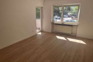 Milbertshofen: Ruhig gelegene 3-Zi.-Whg. mit überdachtem Südbalkon u. TG.-Stellplatz.