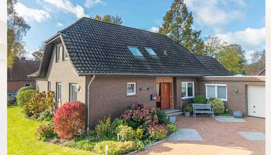 Bild von Willkommen daheim – großzügiger Wohnkomfort mit Kamin, Garten und moderner Ausstattung