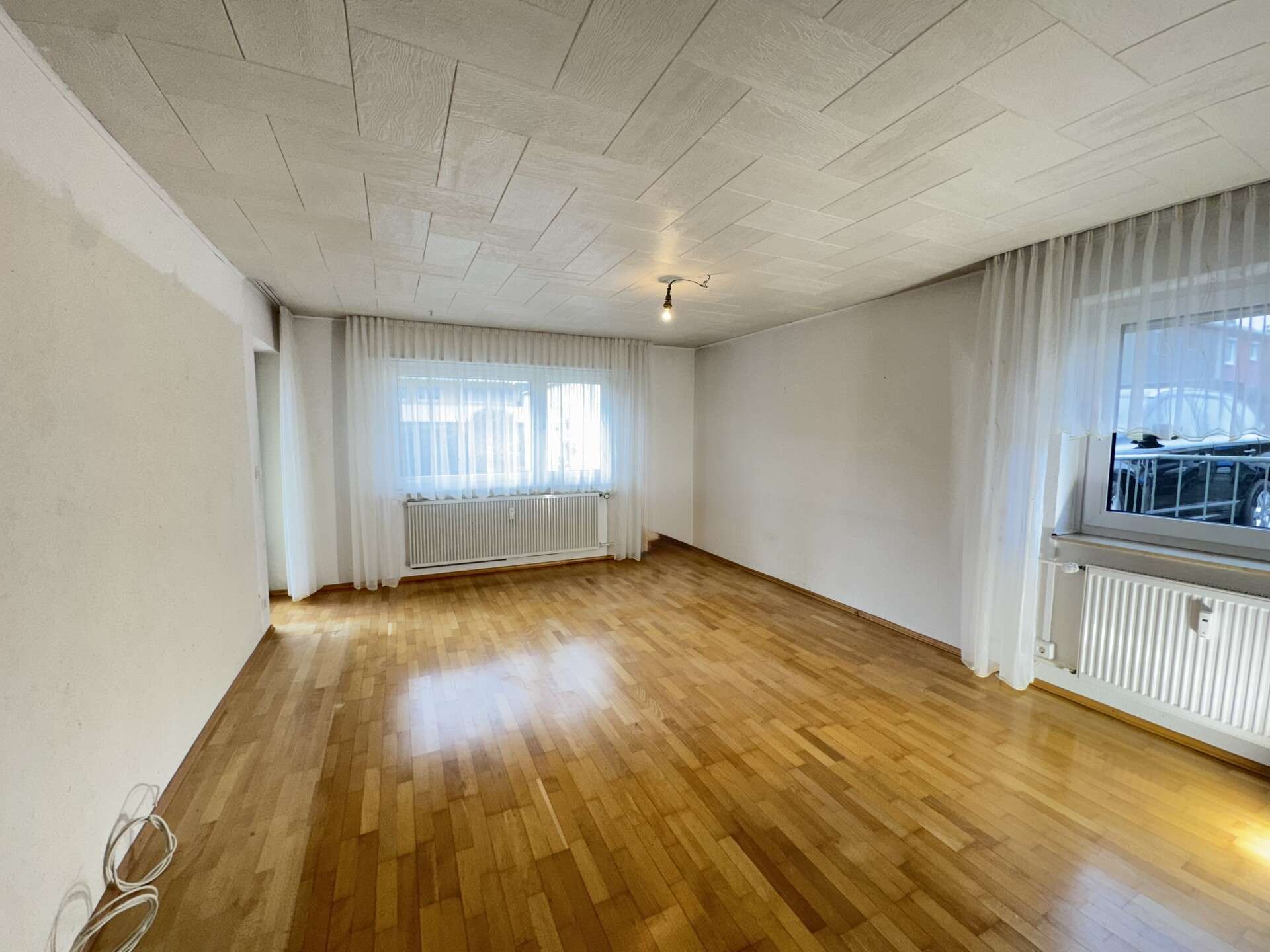 Immobilie in Friedrichshafen - 3-Zimmer-EG-Wohnung mit eigenem Eingang, West-Terrasse & Stellplatz - Bild 1