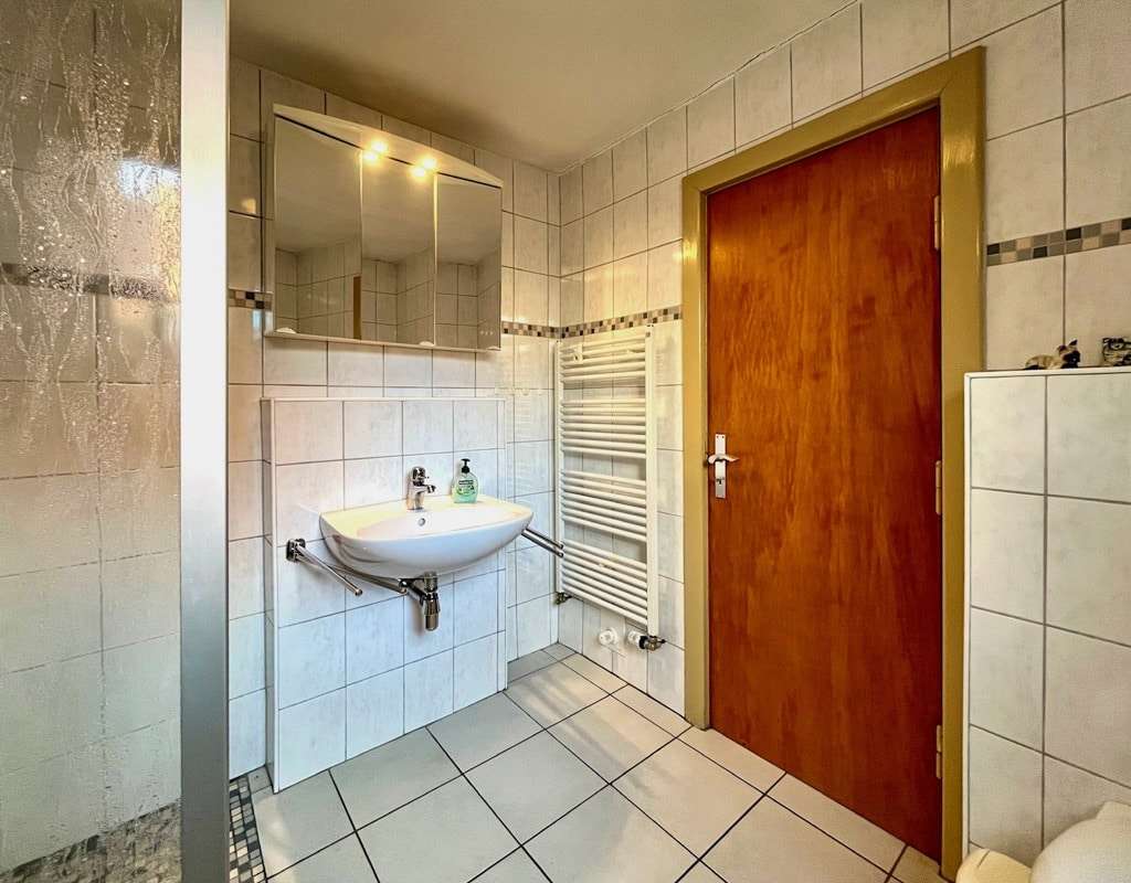 Immobilie in Tönning - Stadtnah wohnen: Einfamilienhaus mit minimalem Pflegeaufwand - Bild 0