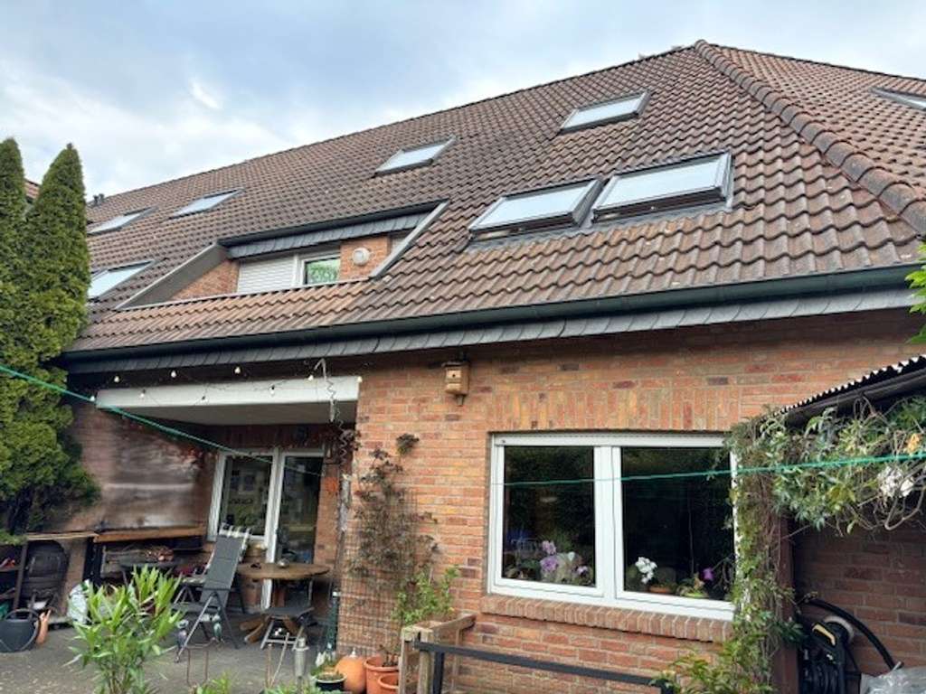 Reihenhaus als Eigentumswohnung mit eigener Tiefgarage und Garten
