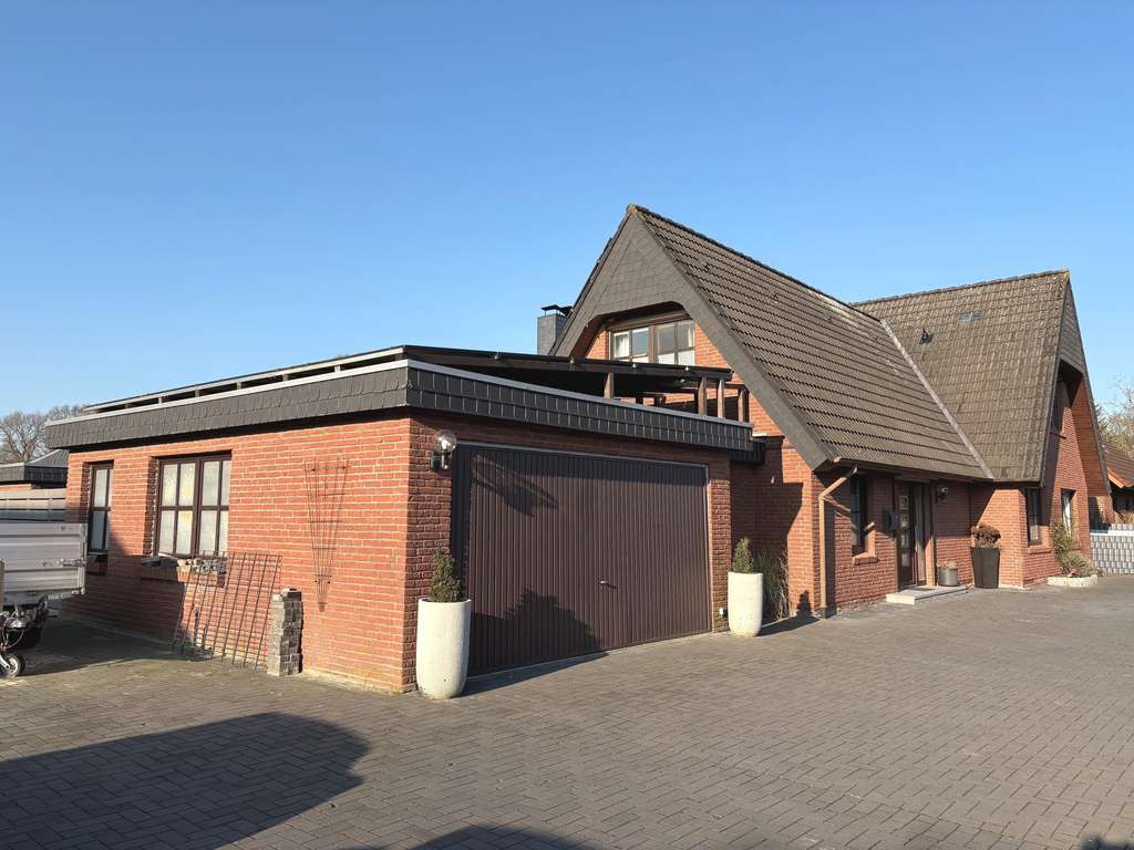 Immobilie in Nortmoor - Außergewöhnliches, großzügiges Einfamilienhaus in ruhiger Wohnlage von Nortmoor - Bild 2