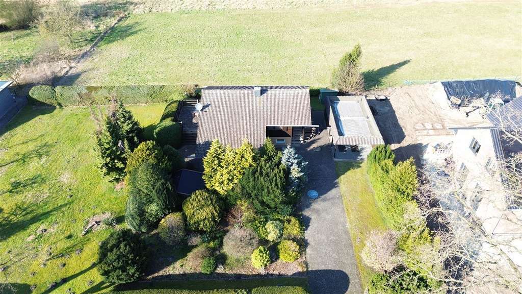 Immobilie in Steyerberg - Charmantes Blockbohlenhaus mit Sonnenterrasse mit tollem Weitblick u. einer beheizbaren Vollkeller. - Bild 4
