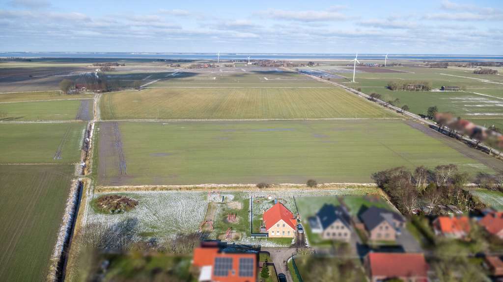 Immobilie in Hagermarsch - Wo Weitblick auf Leuchtturm trifft - Modernes Friesenhaus mit Weitblick in Hagermarsch - Bild 1
