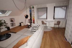 2 Zimmer-Dachgeschosswohnung mit Garage