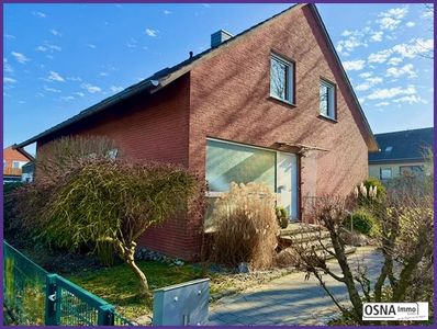 Ein- oder Zweifamilienhaus großem Garten und Garage in Bissendorf