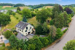 Exklusives Einfamilienhaus mit Traumgarten, Sauna und viel Komfort