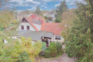 Zuhause inkl. Garten, 2 Garagen und Carportstellplatz in Wassernähe