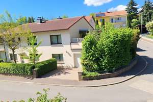 Charmantes Einfamilienhaus mit Einliegerwohnung – Wohnen, Arbeiten oder Vermieten unter einem Dach