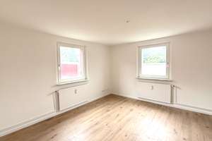 Charmante 3-Zimmer-Wohnung inklusive Mietergarten und EBK – Sudetenweg 25, 38448 Vorsfelde, Wolfsburg – Vorschaubild 1
