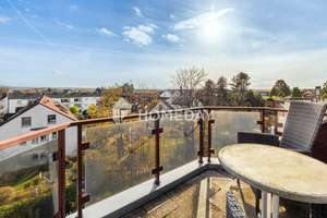 Fernblick, Balkon, Tiefgarage: Ihre Maisonette über den Dächern von Düsseldorf