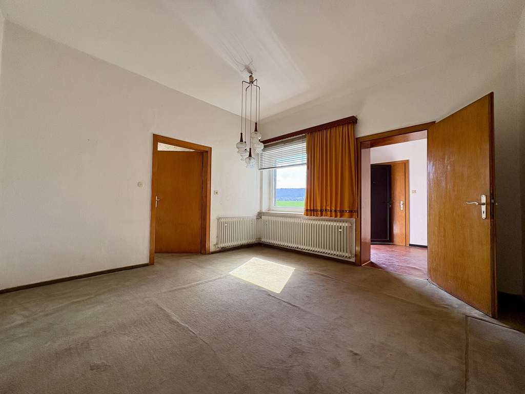 Immobilie in Minden - Wohnhaus mit ausbaufähigem Dachgeschoss & Blick auf das Wiehengebirge in Minden-Haddenhausen - Bild 3