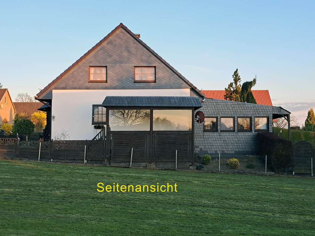 Immobilie in Wölpinghausen - Einfamilienhaus mit Garage in Wölpinghausen, 6 Zimmer - Bild 1
