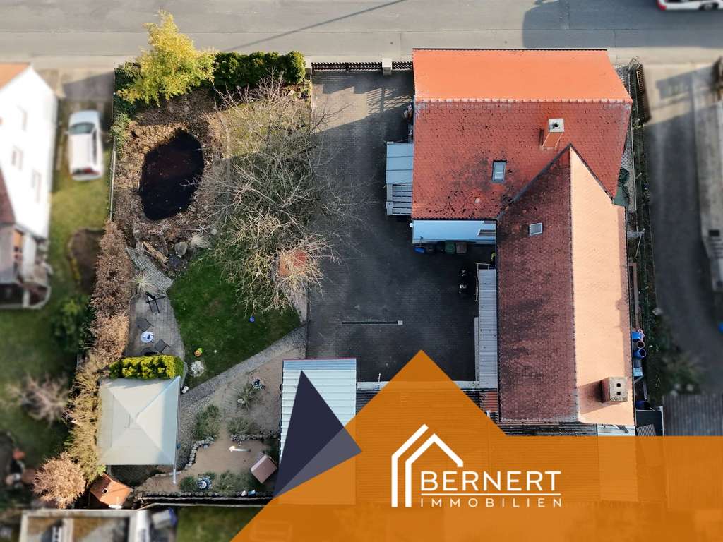 Immobilie in Gundelsheim - Großzügiges Mehrfamilienhaus mit Doppelgarage, Gartenidylle und vielseitigem Nutzungspotenzial - Bild 4