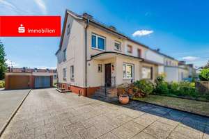 Frankfurt-Zeilsheim: Gepflegte Doppelhaushälfte mit Garten, Garage und viel Potenzial