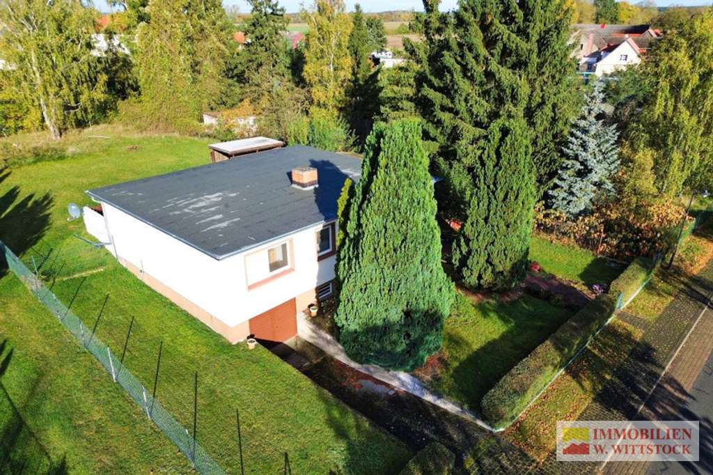 Immobilie in Wittstock/Dosse - Grundstück mit Einfamilienhaus in Seenähe - Bild 1