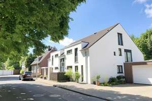 Wohnen am Erikaplatz - moderne Terrassenwohnung mit Blick in einen parkähnlichen Garten