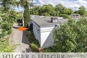 Absolut ruhig gelegen: Bungalowmäßiges Atriumhaus mit ausgebautem UG