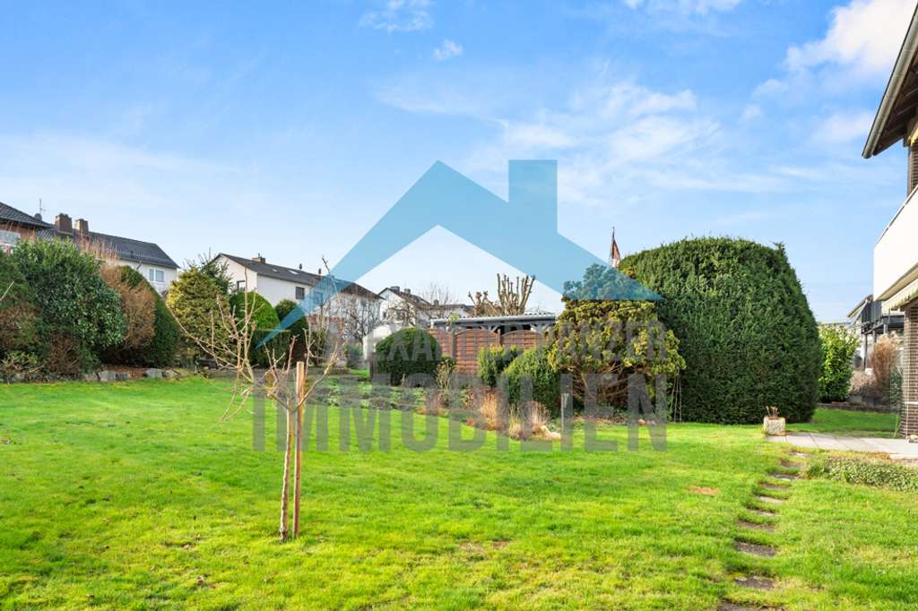 Immobilie in Lohfelden - Großzügiges Zweifamilienhaus mit viel Platz in zentraler Lage von Lohfelden! - Bild 2