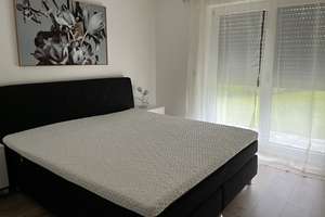 Neues Kapitel in Neuching: Helle möblierte 2-Zimmer-Wohnung mit Terrasse – Weidenweg 1a, 85467 Neuching – Vorschaubild 6