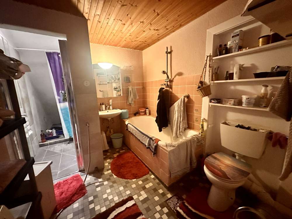 Immobilie in Scharbeutz - Wohnen im alten Garten - DHH mit Charme - Bild 1