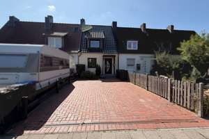 Reihenmittelhaus mit Garten und vielseitigem Gestaltungspotenzial in Kiel-Wellsee