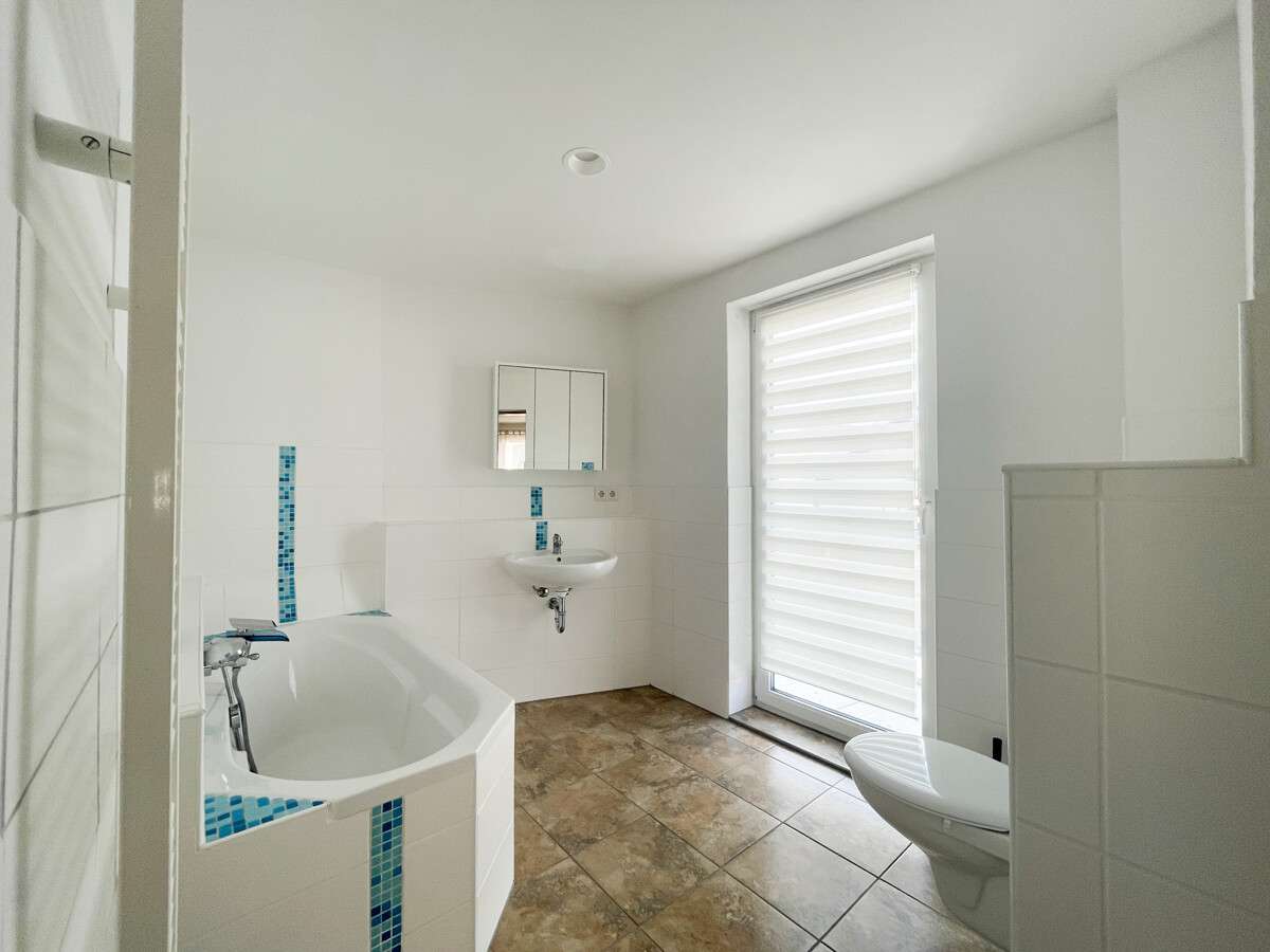 Immobilie in Aiterhofen - Viel Platz, klare Struktur – renditestarkes Mehrfamilienhaus in Aiterhofen - Bild 3