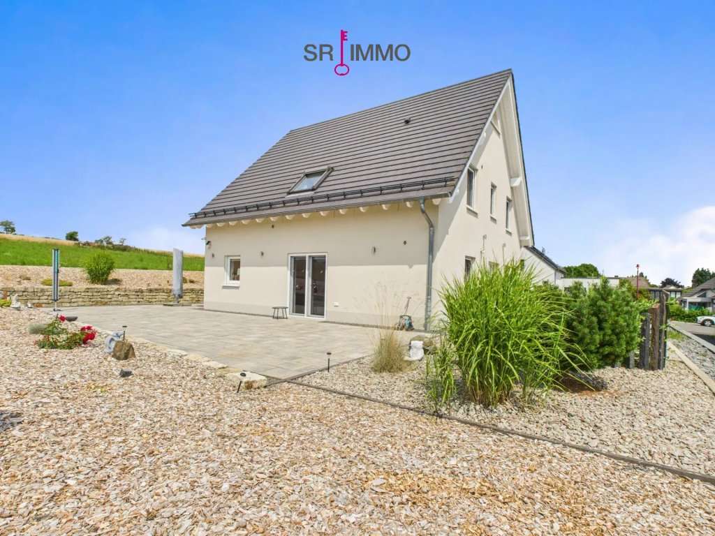 Immobilie in Daleiden - Wohnen am Rande der Natur – modernes Einfamilienhaus mit Weitblick in Daleiden - Bild 1