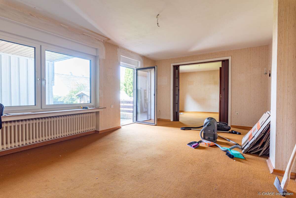 Immobilie in Hagenburg - Sanierungsbedürftiges Zweifamilienhaus in bester Lage Hagenburgs mit Garage und Garten - Erbbau! - Bild 0