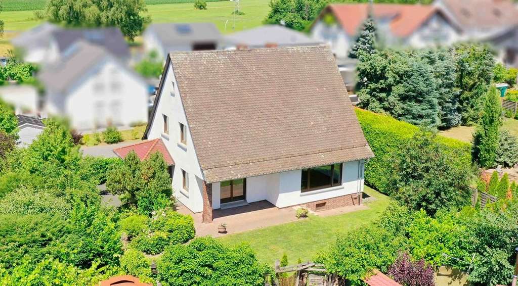 Immobilie in Hasselroth - Hübsches Einfamilienhaus mit schönem Garten in ruhiger Lage von Niedermittlau - Bild 0