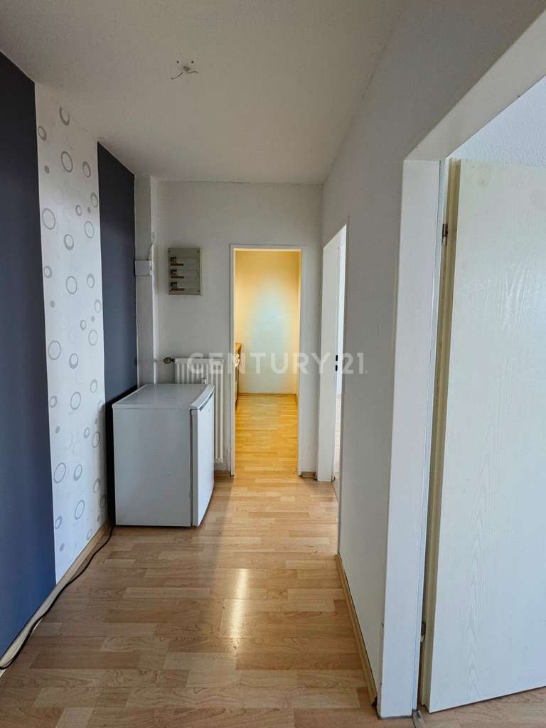 Immobilie in Flörsheim - Koffer packen und einziehen! Renovierte 2-Zimmer-Wohnung in ruhiger Lage - Bild 1