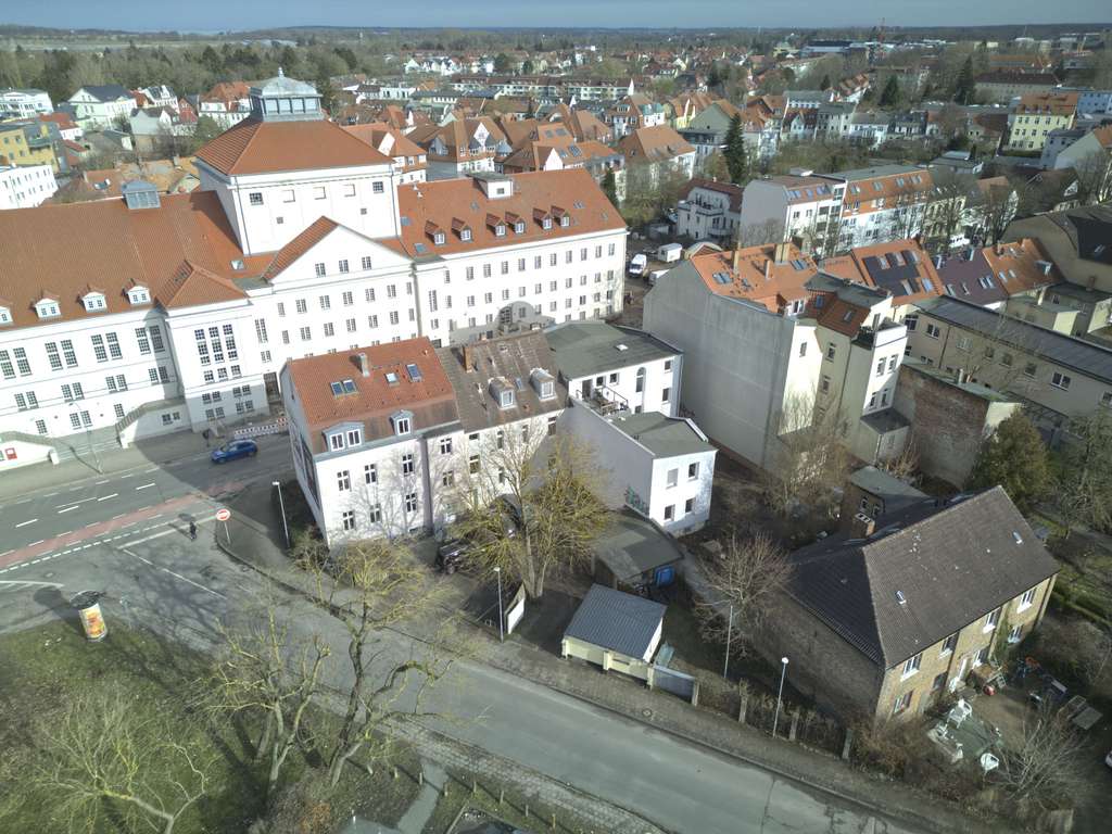 Immobilie in Greifswald - Attraktives Wohn- und Geschäftshaus mit solider Bausubstanz und Entwicklungspotenzial - Bild 1