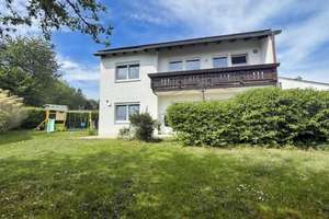 Charmantes Einfamilienhaus mit großzügigem Wohnbereich & Traumgarten