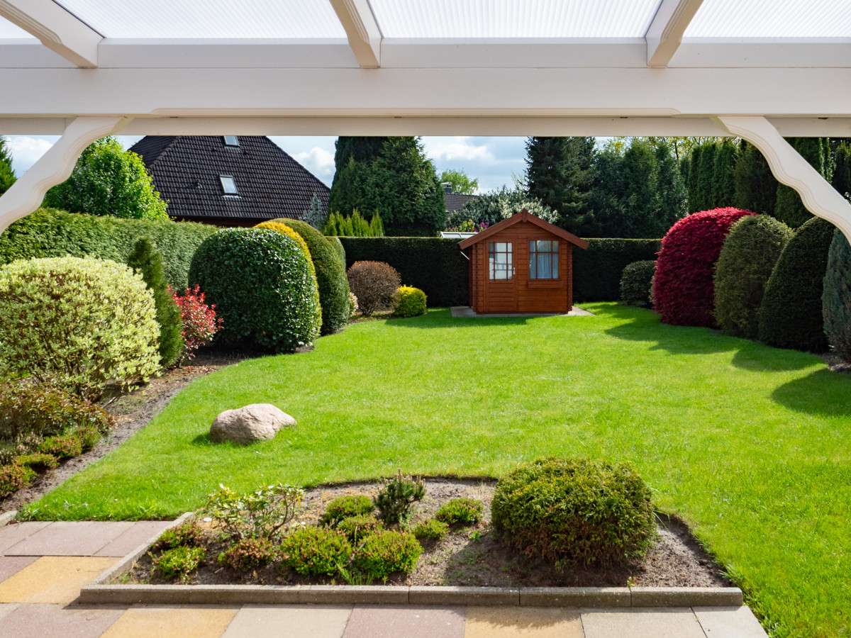 Immobilie in Hasloh - Reihenhaus mit Garage - gepflegt, ruhige Wohnlage, versetzte Bauweise, Ausbaureserve - Bild 1