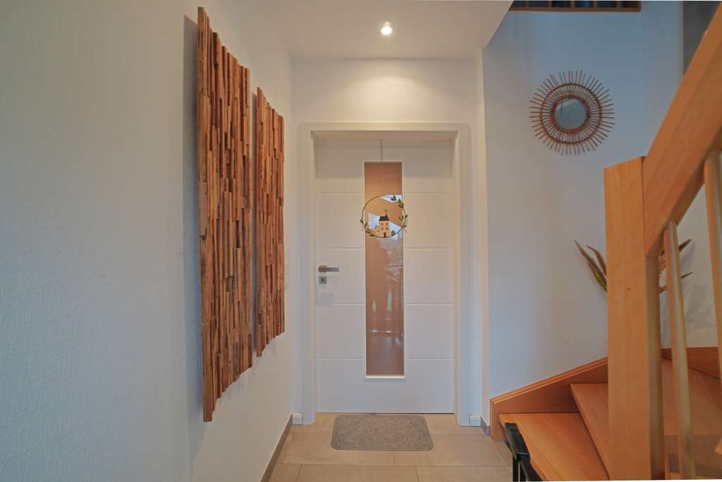 Immobilie in Rhede - Für Gartenfreunde zur neuen Saison:
Moderne Maisonettewohnung mit großem Garten in Rhede
 - Bild 2