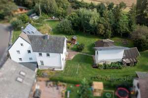 Gepflegtes Ein- bis Zweifamilienhaus mit PV-Anlage auf großem Grundstück in Ortsrandlage – Die vollständige Adresse der Immobilie erhältst du vom Anbieter., 55469 Nannhausen – Vorschaubild 5