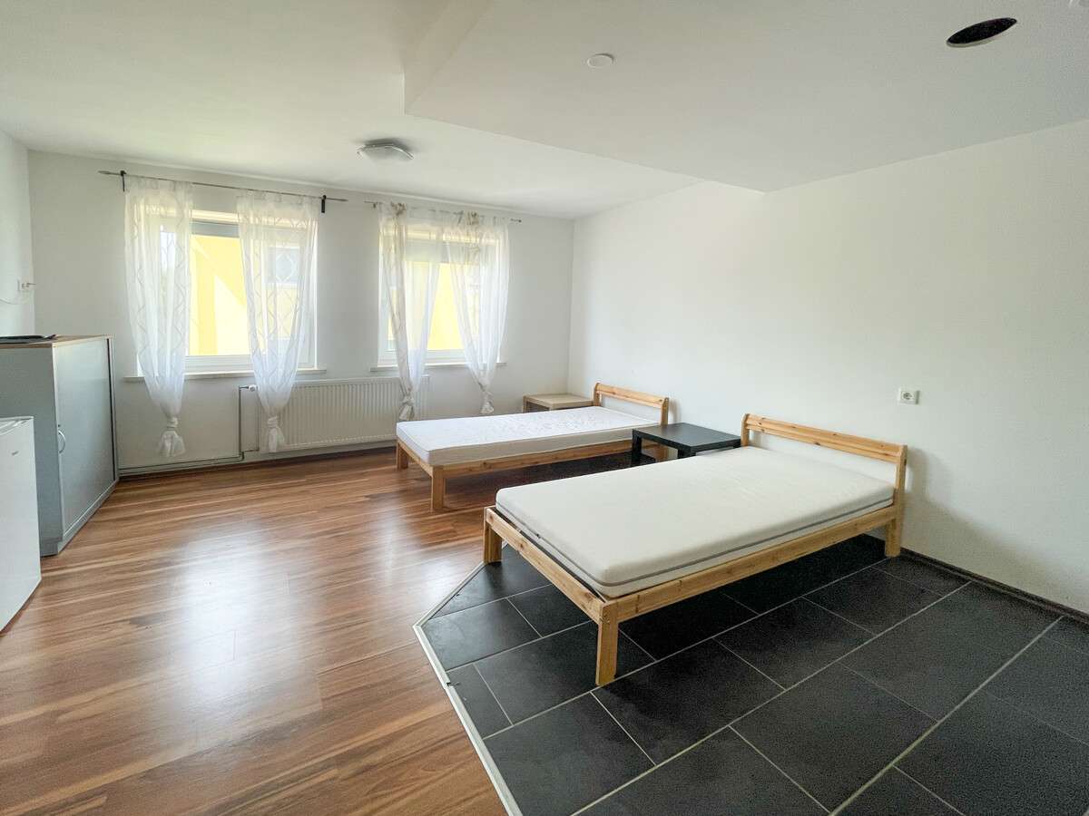 Immobilie in Aiterhofen - Viel Platz, klare Struktur – renditestarkes Mehrfamilienhaus in Aiterhofen - Bild 2