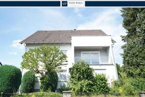 Charmantes Zweifamilienhaus mit großem Garten in attraktiver Wohnlage