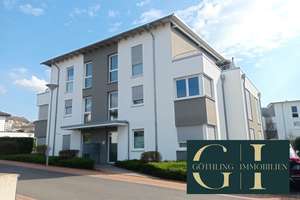 Schicke Erdgeschosswohnung mit moderner Einbauküche, Außen- und TG-Stellplatz im beliebten Neubaugeb