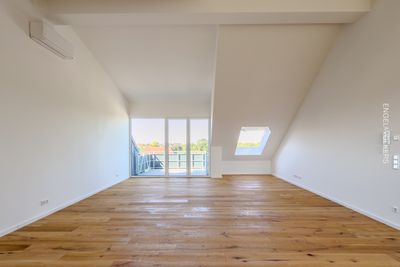 Neue Dachgeschosswohnung mit Neckarblick in Ilvesheim