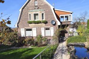 Stilvolles Wohnhaus mit schönem Grundstück, Garage und Wintergarten – Halbe Hufe 1, 38723 Seesen – Vorschaubild 1